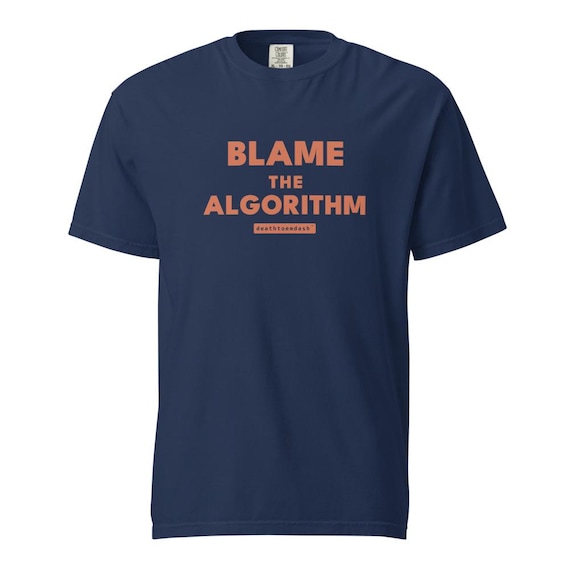 blame the algorithm tee, shown flat so the design reads