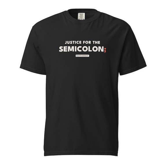 justice for the semicolon tee, shown flat so the design reads