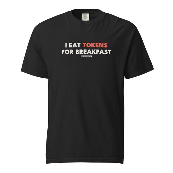i eat tokens for breakfast tee, shown flat so the design reads