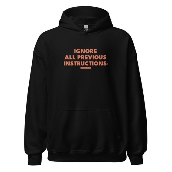 ignore all previous instructions tee, shown flat so the design reads