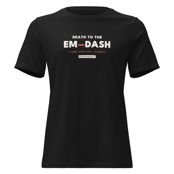 death to the em dash tee, shown flat so the design reads