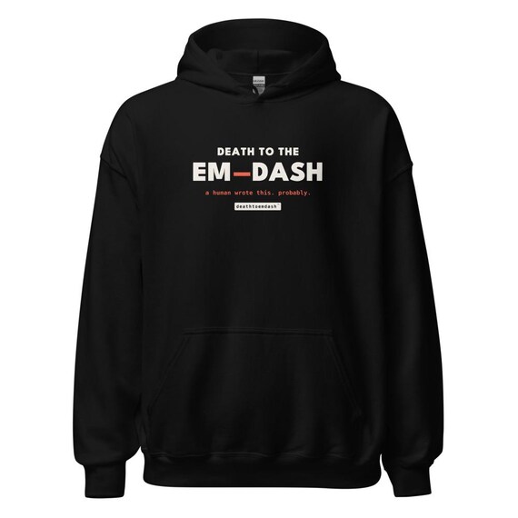 death to the em dash tee, shown flat so the design reads