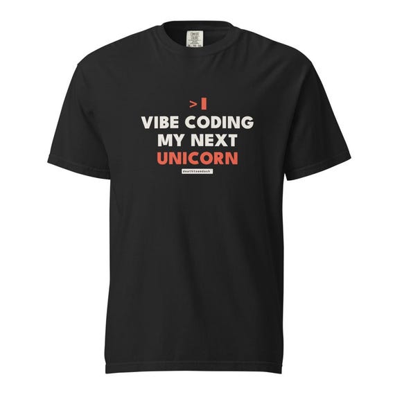 vibe coding my next unicorn tee, shown flat so the design reads