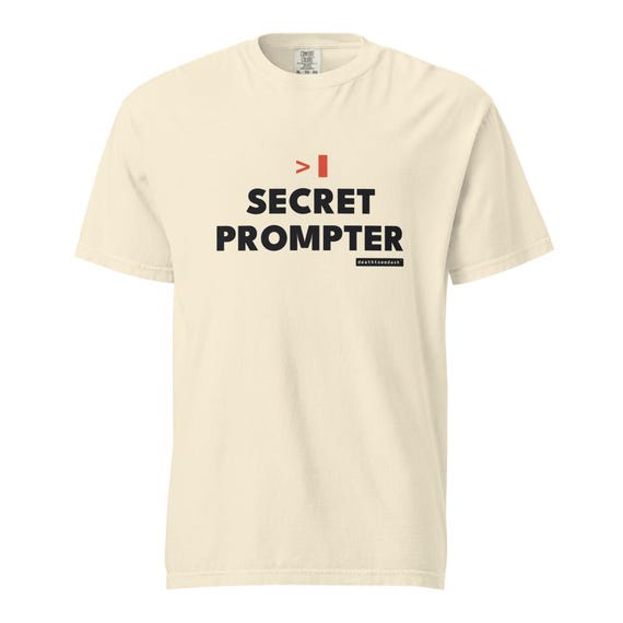 secret prompter tee, shown flat so the design reads