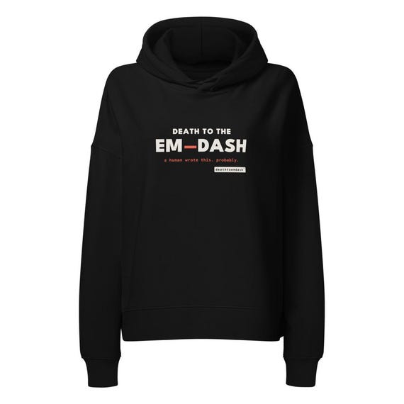 death to the em dash tee, shown flat so the design reads