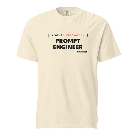 recovering prompt engineer tee, shown flat so the design reads